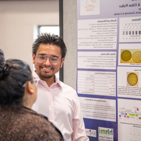A student presents their research at the 2023 Celebration of Scholars.